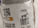 a bag of pills sitting on a table with a barcode on it
