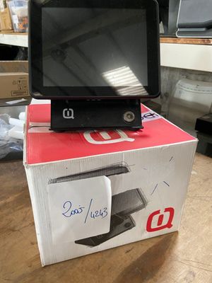 an open box with a computer on top of it sitting on a table