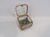 an image of a small glass box with rocks inside of it