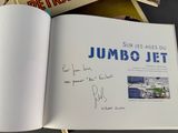 an open book with a picture of a plane on it