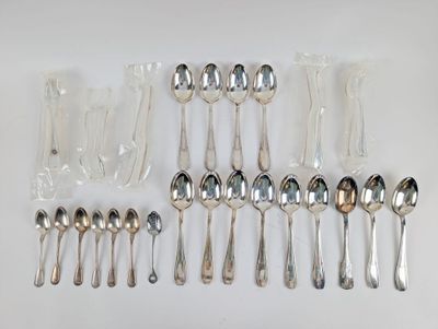 a lot of silver spoons and spoon spoons on the table