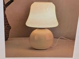 a picture of a lamp that is sitting on a table