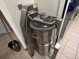 a trash can in the middle of the floor next to a trash can