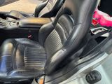 a picture of a black leather seat in a car