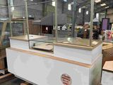 a counter with a glass top in a warehouse