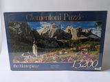 la boîte à puzzle est ornée d'une image représentant une scène de montagne