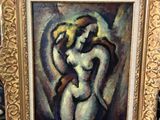 une peinture à l'huile représentant une femme tenant un enfant dans ses bras