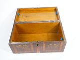 a small wooden box with a lock on it