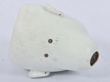 a small white object with a hole in the middle of it
