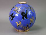 an image of a blue vase with gold decoration
