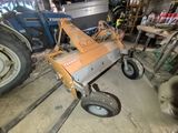 a tractor that is parked in a garage
