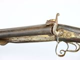 an old gun that has been used as a weapon for a war