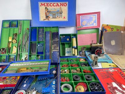 a lot of different items in a box on the table