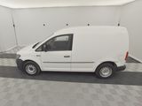 the white van is parked in a clean room with a checkered floor