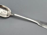 a spoon that is sitting on a table