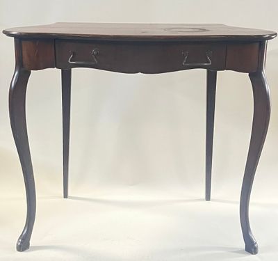 a small table with a drawer on top of it