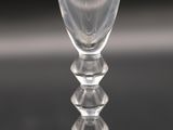 a close up of a glass of water on a table