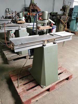 a machine that is sitting on a pallet in a warehouse
