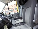 a view of the inside of a van from the driver ' s seat