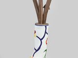 a vase with a plant in it that has arrows sticking out of it