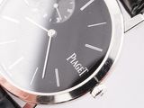 a close up of a wrist watch with a black face