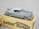 a toy car that is sitting on top of a box