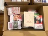 a box full of books sitting on the floor