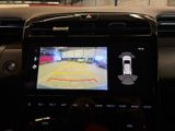 the dashboard of a car with a camera mounted to it ' s dashboard