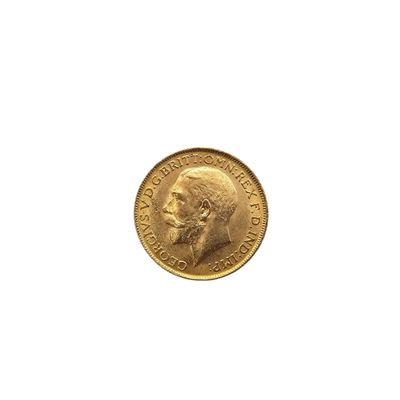 a close up of a gold coin with a man ' s face on it