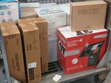 many boxes on a cart in a store that is full of stuff