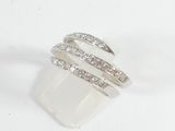 a close up of a ring with diamonds on a white background
