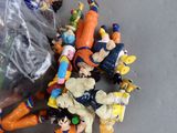 a lot of action figures that are on the table