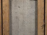 an old wooden frame with a picture of a cat on it ' s side