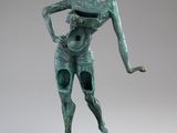 an image of a bronze statue of a woman with a hat on her head