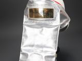 a silver bag with a helmet attached to it