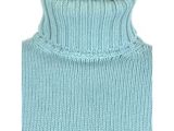 a close up of a blue sweater on a mannequin mannequin mannequin mannequin mannequin mannequin mannequin manne