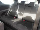 two seats in the back of a car that are empty