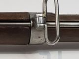 a close up of a metal object on a white surface