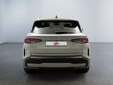 the rear end of a white suv parked in a room