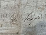 a close up of a piece of paper with writing on it