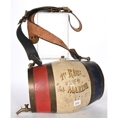 an old fashioned fire extinguisor with a leather strap