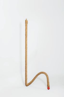 a rope that is sitting on top of a white surface