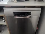 an image of a kitchen with a microwave and a dishwasher