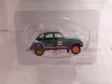 a green and purple car in a clear box