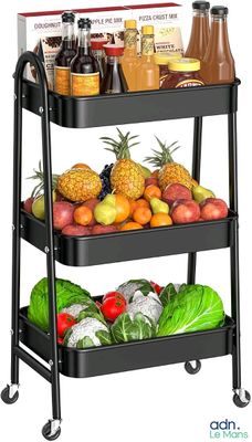 chariot à deux niveaux sur lequel sont disposés divers fruits et légumes