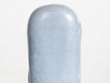 a blue vase sitting on top of a white pedestal