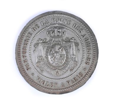 an image of a silver coin with a coat of arms on it