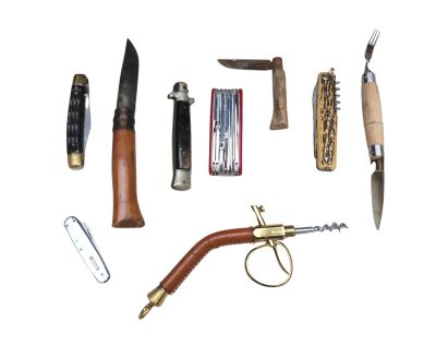 many different types of knives and knives on a white surface