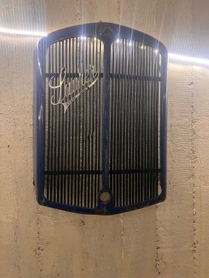 an image of a vintage car grille on a wall
