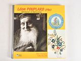 yellow book with a picture of a man with a long white beard